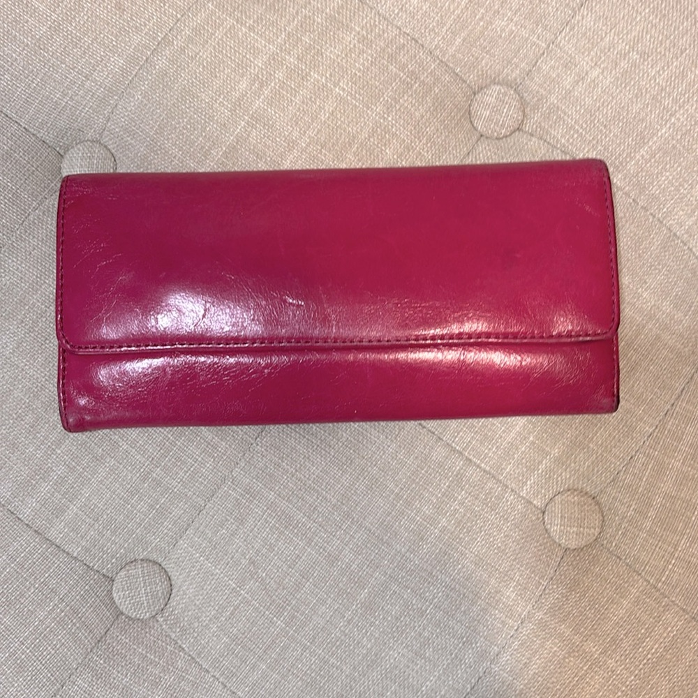 HOBO hot pink leather wallet.
